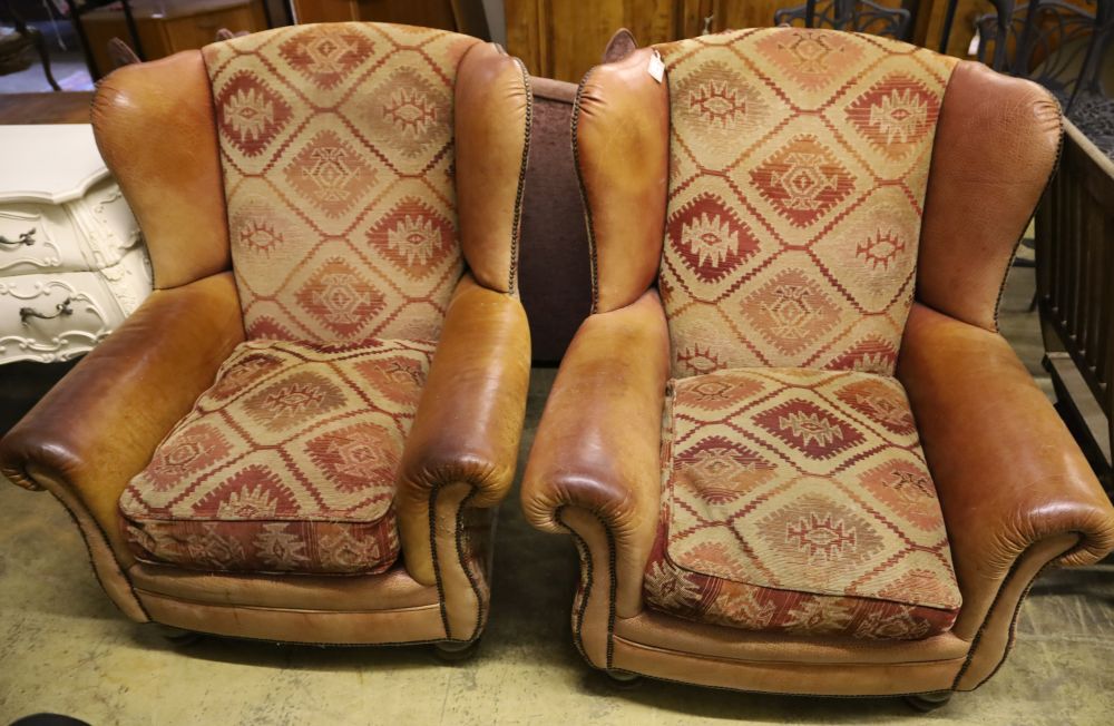 A pair of Tetrad style leather and kelim fabric upholstered wing club armchairs